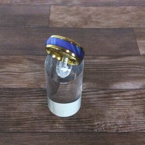 New, Men's Ring - Band is Gold Stainless Steel. The exterior is blue.